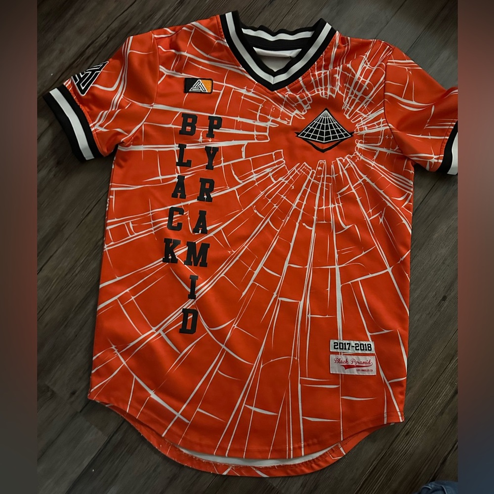 Black Pyramid Orange and White Graphic Jersey